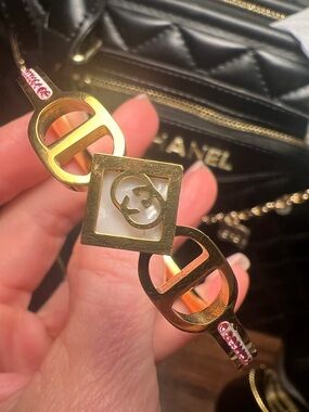 Gold-Toner Bracelet with Mother-of-Pearl and Pink Crystal Accents